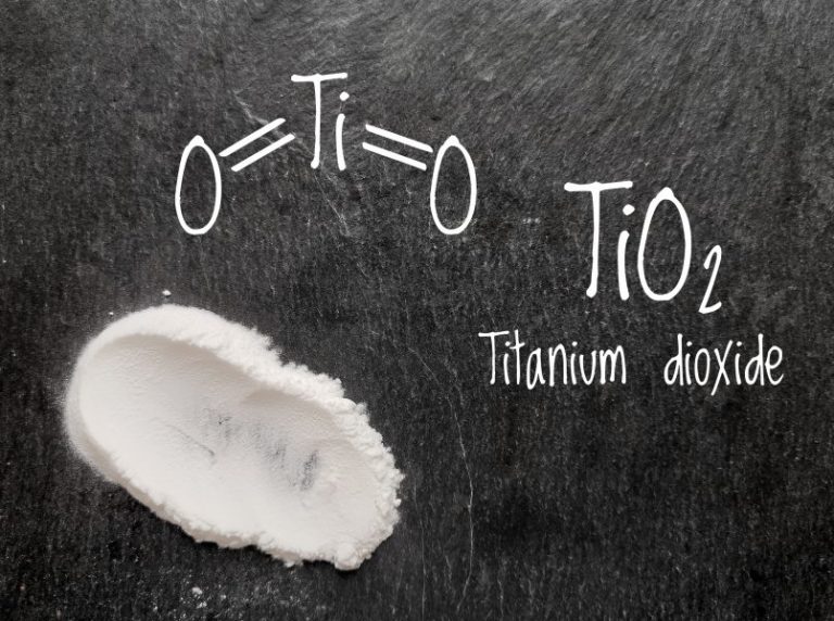 Chemica-formula-of-titanium-dioxide-molecule-with-white-titanium-dioxide-powder-805x600-1-768x572